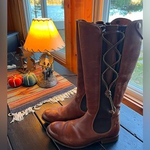 Frye leather boots with ties down the outside of them. - cognac brown